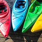 four kayaks on a deck